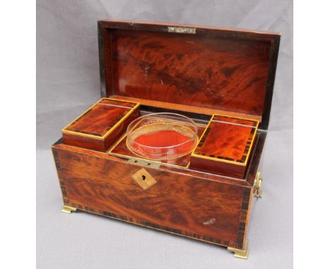 A George III mahogany tea caddy, of rectangular form with rosewood crossbanding, the interior fitted with two lidded compartm