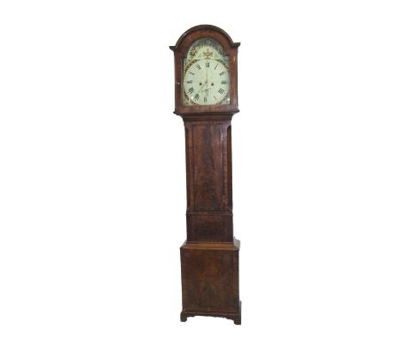 Early C19th Flame Mahogany Longcase Clock with tall plinth on short bracket supports, cross banded panel under rectangular ce