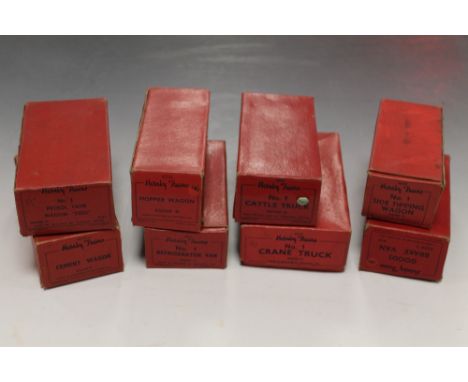 EIGHT BOXED HORNBY TRAINS, "O" Gauge rolling stock to include "Esso" petrol tanker, goods brake van, No1 crane truck, "Blue C