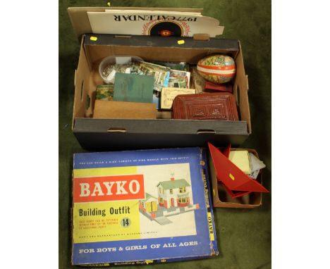 A COLLECTION OF ASSORTED TOYS, to include glass marbles, postcards, tocoptics, a miscroscope in a fitted box, lockable wooden