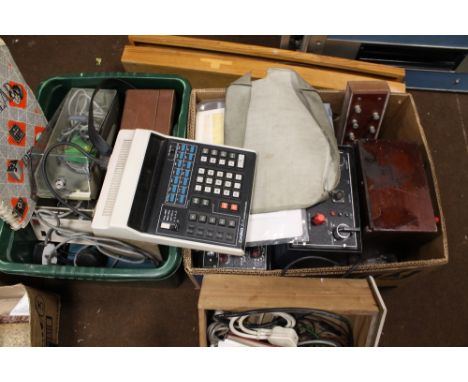 TWO BOXES OF ELECTRICAL TESTING EQUIPMENT, to include a Casio fx3 scientific calculator, voltmeter, ampere meter, etc