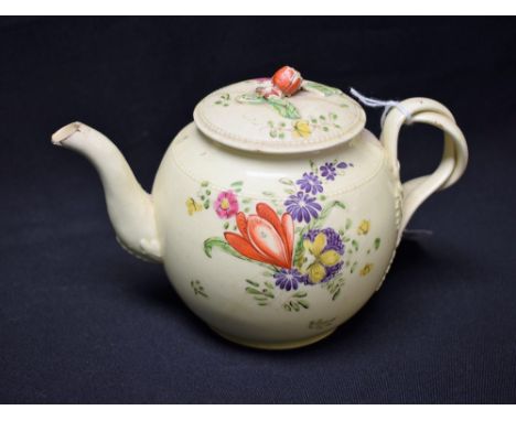 An 18th century globular teapot and cover, decorated with stylised flowers and foliage in colours, beaded borders, flower fin