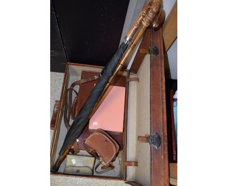 A brown leather suitcase; another smaller; a Sirram ladies vanity case with fitted interior; a walking stick, Kodak Brownie c