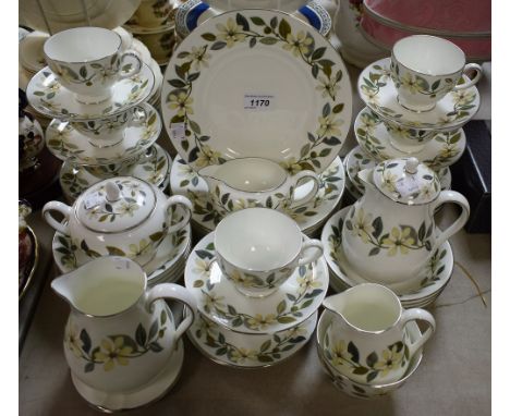 An extensive Wedgwood Beaconsfield pattern nine setting tea and dessert service, including milk and cream jugs, sugar bowl, c