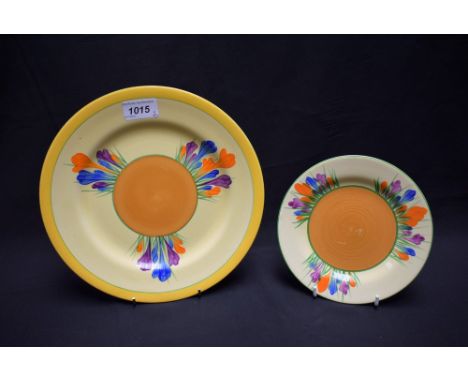 A Clarice Bizarre Cliff Crocus pattern circular plate, brightly decorated with crocus, 26cm diam, printed Newport mark in bla