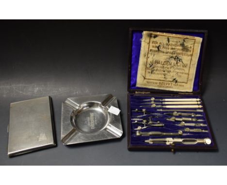 A set of drawing instruments; an Art Deco cigarette case; an advertising ashtray, Osborn's Evershyne Steel (3)