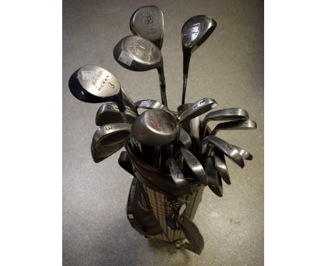 A part set of lady's golf clubs in a caddy bag, including Howson, UGS Pro-elite, others similar; qty