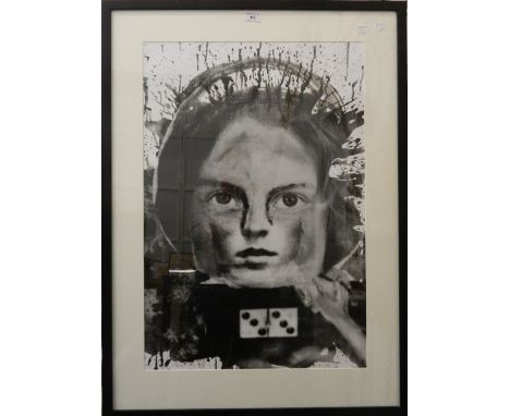 A photographic print, Child and a Domino, indistinctly signed, framed and glazed. 49 cm wide.