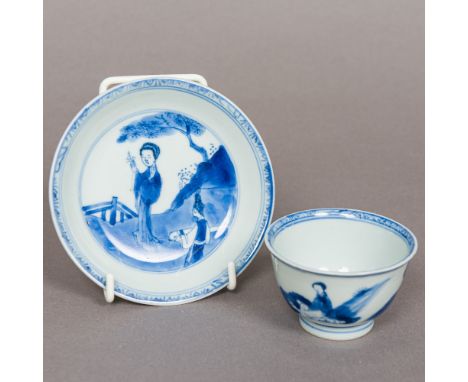 An 18th century Chinese blue and white porcelain tea bowl and matched saucer, each piece decorated with various figures, the 