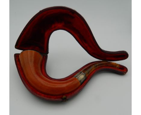 A late 19th/early 20th century silver mounted cased pipe. 20 cm long.