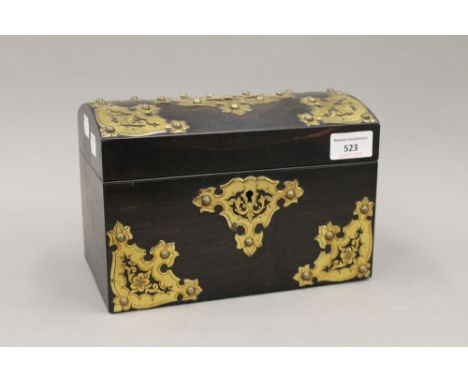 A Victorian brass mounted coromandel tea caddy. 23 cm wide.