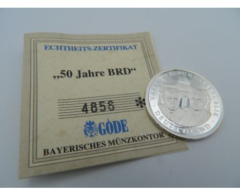 A German silver coin. 3 cm diameter.