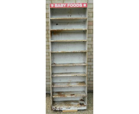 A vintage metal shelving unit. 189 cm high.