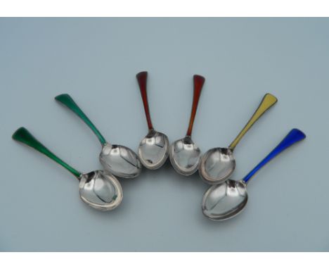 A set of six silver and enamel Cartier coffee spoons. 10 cm long (79.1 grammes total weight)