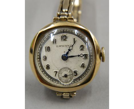 A vintage ladies 9 ct gold Eswang Swiss made watch on a 9 ct gold on silver bracelet. 2.5 cm wide (20.5 grammes total weight)