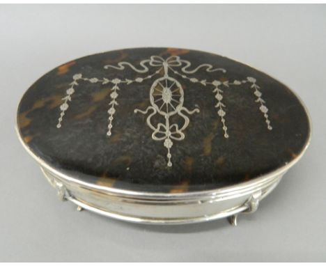 A large tortoiseshell mounted silver trinket box.  18.5 cm wide, 6 cm high.