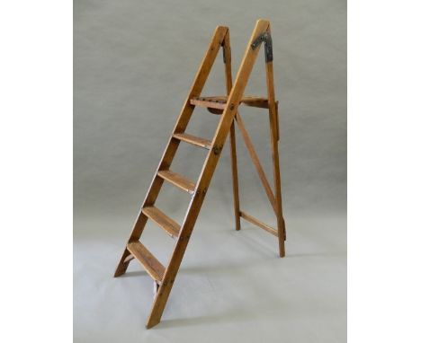 A vintage wooden step ladder. 155 cm high.