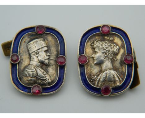A pair of stone set silver and enamel cufflinks, bearing Russian marks. 2.5 cm high.