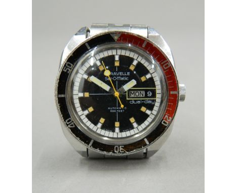 A vintage Caravelle jewel date Set-O-Matic automatic 666 ft divers watch. 4 cm wide.