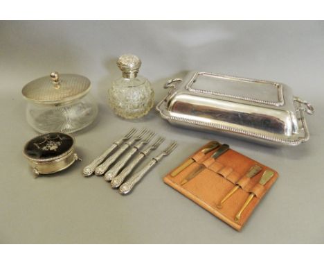 A silver top dressing pot, a scent bottle, a trinket box and a plated entree dish. The entree dish 30 cm wide.