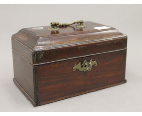 A Georgian mahogany tea caddy with fitted interior. 24 cm wide.