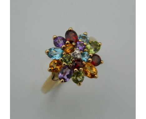 A 9 ct gold multi-gem set ring. Ring size K.