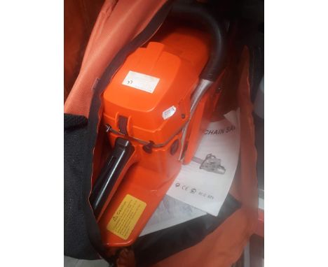 A chainsaw with orange cover 