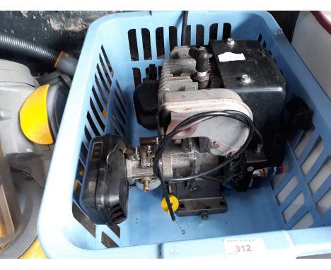 A petrol lawn mower engine 