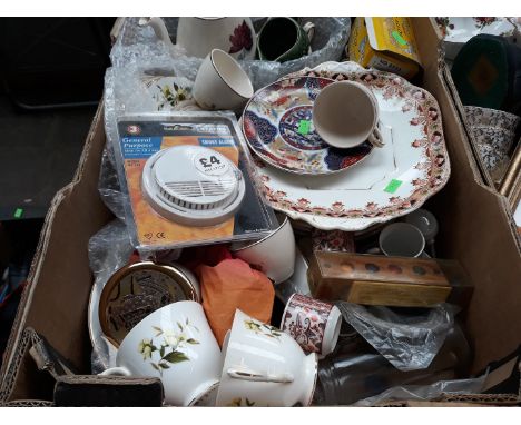 Two boxes of assorted pottery ornaments. figures, cups and saucers 