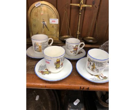 A set of 4 cups and saucers depicting nursery rhymes 