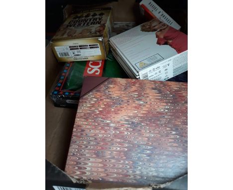 A box of DVDs, Scrabble game, etc 