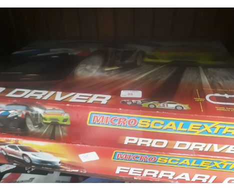 Two boxed Micro Scalextric games 