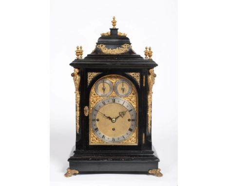 An Ebonised Chiming Table Clock, circa 1890, inverted bell top with urn finials, side carrying handles and sound frets, raise