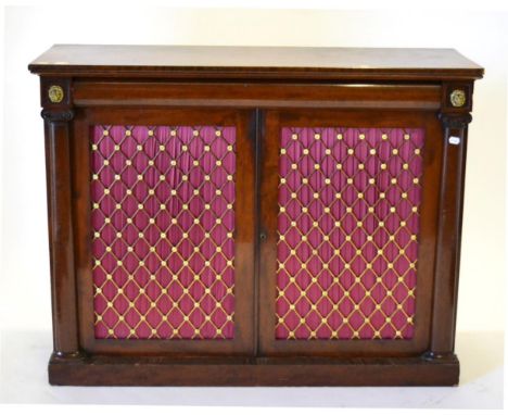 A Late Regency Mahogany Side Cabinet, 2nd quarter 19th century, the cushion shaped drawer above two brass and silk gathered g