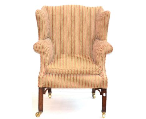 A George II Style Lady's Wing Back Armchair, late 19th century, recovered in red and green striped corduroy fabric, with flar