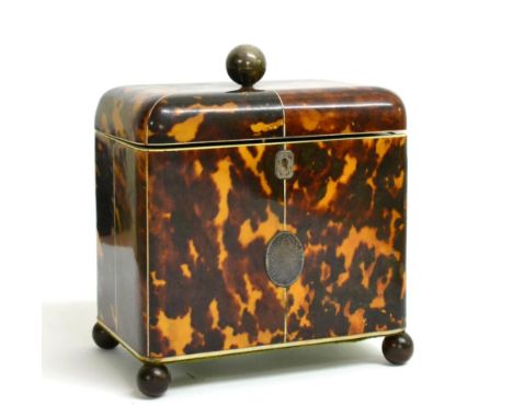 A Regency White Metal Mounted Tortoiseshell Tea Caddy, of rounded rectangular form with ball finial and vacant oval cartouche
