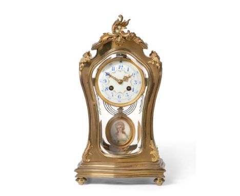An Art Nouveau Brass Four Glass Striking Mantel Clock, circa 1900, applied floral mounts, bevelled glass panels, dial with Ar