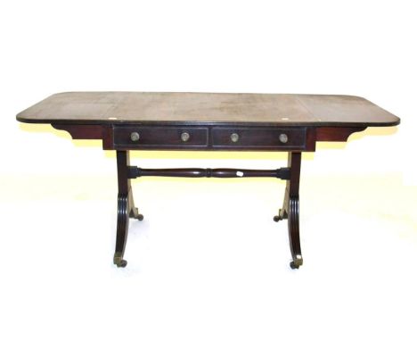 A George III Mahogany Sofa Table, early 19th century, with two drop leaves and reeded edge above two real and two sham drawer