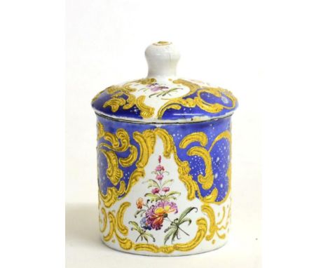 A Staffordshire Enamel Toilet Pot and Cover, circa 1770, of cylindrical form, painted with flower sprays and sprigs within gi