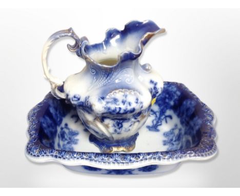 A Victorian blue and white transfer printed wash jug and basin 