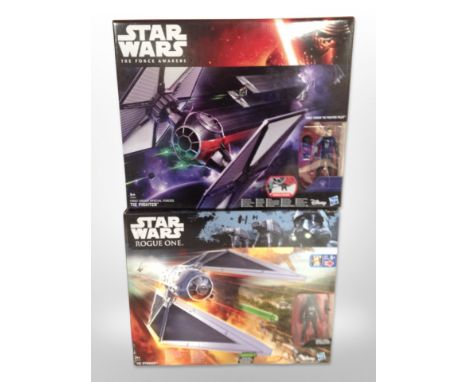 Two Hasbro Disney Star Wars figures, First Order Special Forces Tie Fighter and Tie Striker, boxed.