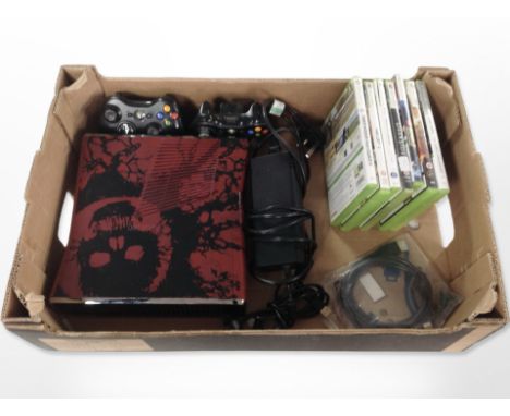 An Xbox 360 console, controllers, games. (1 box)