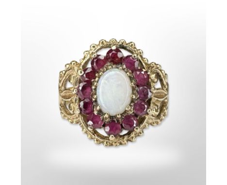 A 9ct yellow gold ruby and opal cluster ring, size M/N. CONDITION REPORT: 3.5g.