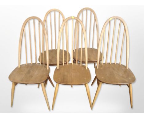 A set of five Ercol light elm and beech spindle back dining chairs 