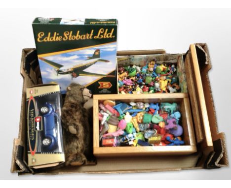 A Corgi Eddie Stobart die-cast Douglas DC-3 plane, a Burago model car, and other toys. (1 box)