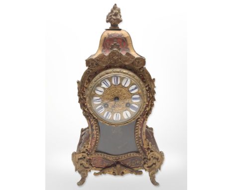 A 19th-century Boulle work tortoiseshell and brass-inlaid 8-day mantel clock, striking on a bell, with pendulum and key, heig