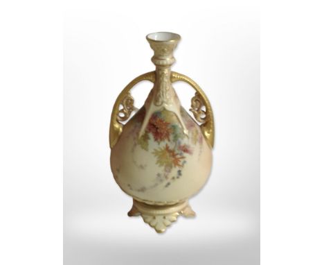 A Royal Worcester blush ivory twin-handled vase, shape number 1142, height 21cm (af). CONDITION REPORT: Hairline crack to rim