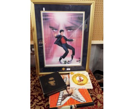 A lithograph of 'Elvis Rocking to Jailhouse Rock' with certificate of authenticity to reverse together with a 'Sun' boxed set