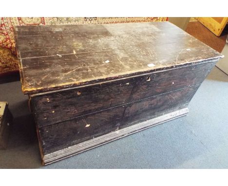 A large Victorian painted pine trunk the hinged lid enclosing candle box