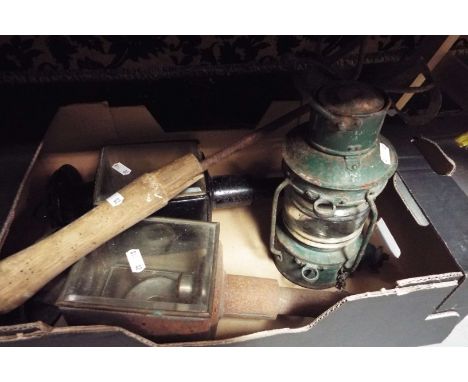 A pair of coaching lamps, and oil lamp and a branding iron